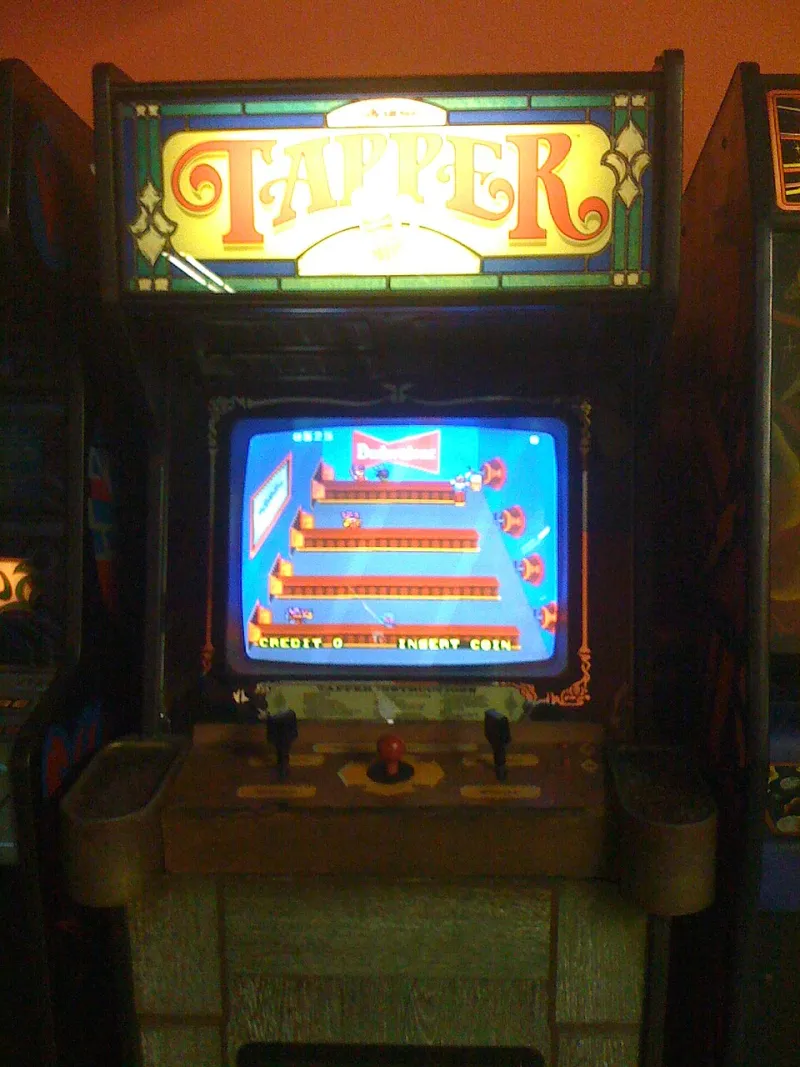 Between Gate B and a Galaga Machine: Chasing Down the Strangest Places Arcades Still Survive